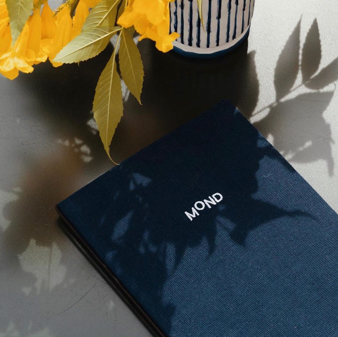 Brand identity for Mond, a Sri Lankan beach hotel. Design